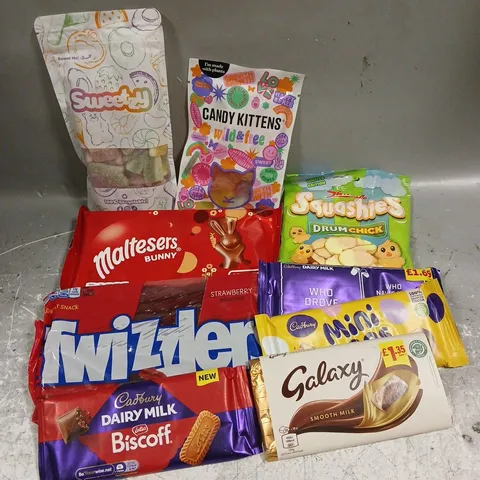APPROXIMATELY 12 ASSORTED FOOD & DRINK ITEMS TO INCLUDE - GALAXY SMOOTH MILK - MALTEASERS BUNNY - CADBURY BISCOFF CHOCOLATE - ETC
