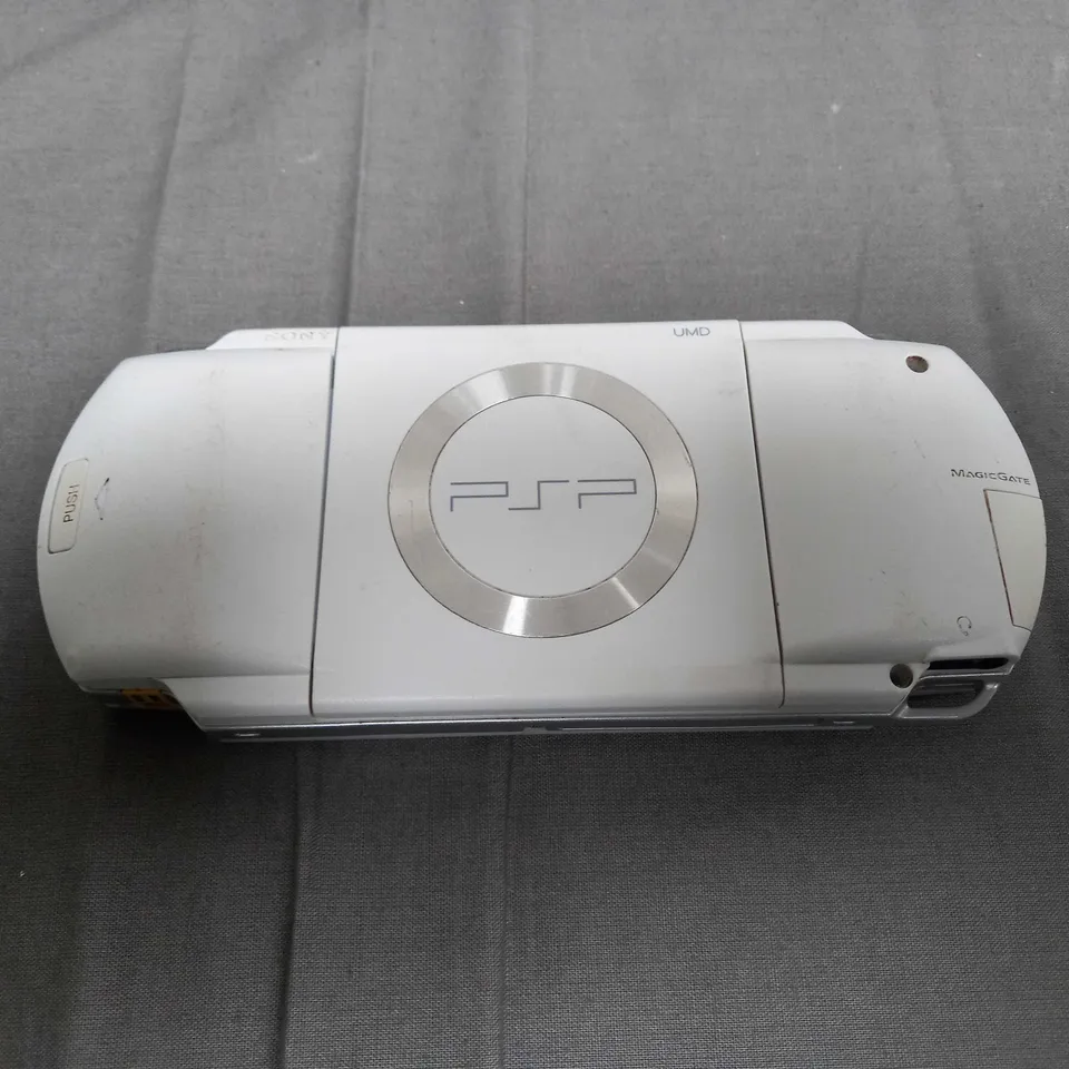 SONY PLAYSTATION PORTABLE HANDHELD GAMES CONSOLE