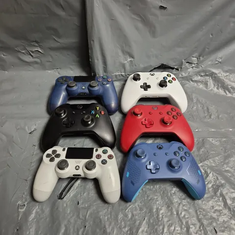 BOX OF APPROXIMATELY 20 ASSORTED GAME CONSOLE CONTROLLERS TO INCLUDE XBOX AND PLAYSTATION