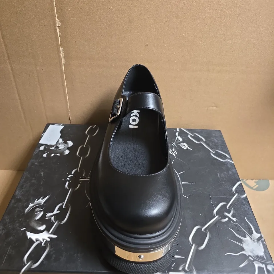 BOXED PAIR OF KOI PENITENT STUDDED SHOES – BLACK, UK4
