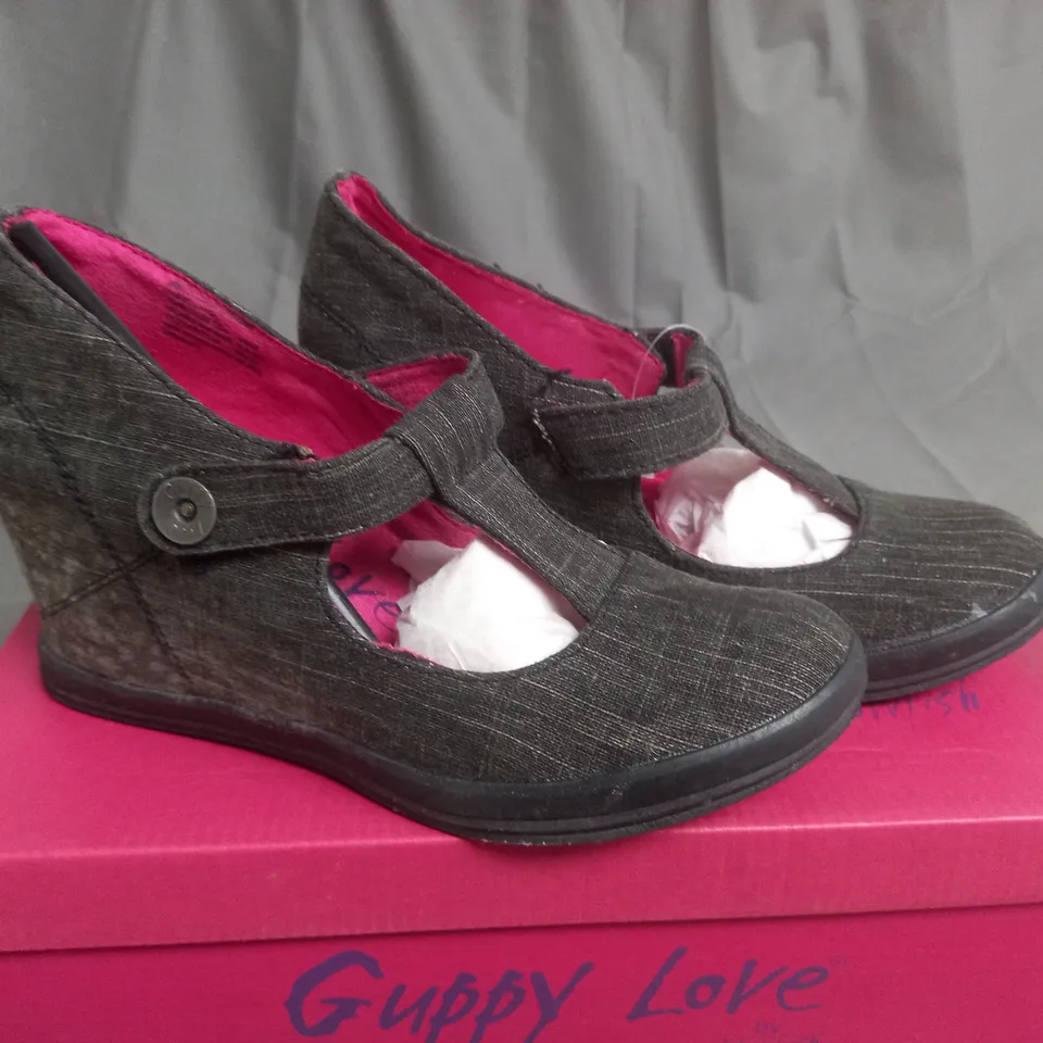 BOX OF APPROXIMATELY 10 BLACK  GUPPY LOVE BY BLOWFISH SHOES IN VARIOUS SIZES 