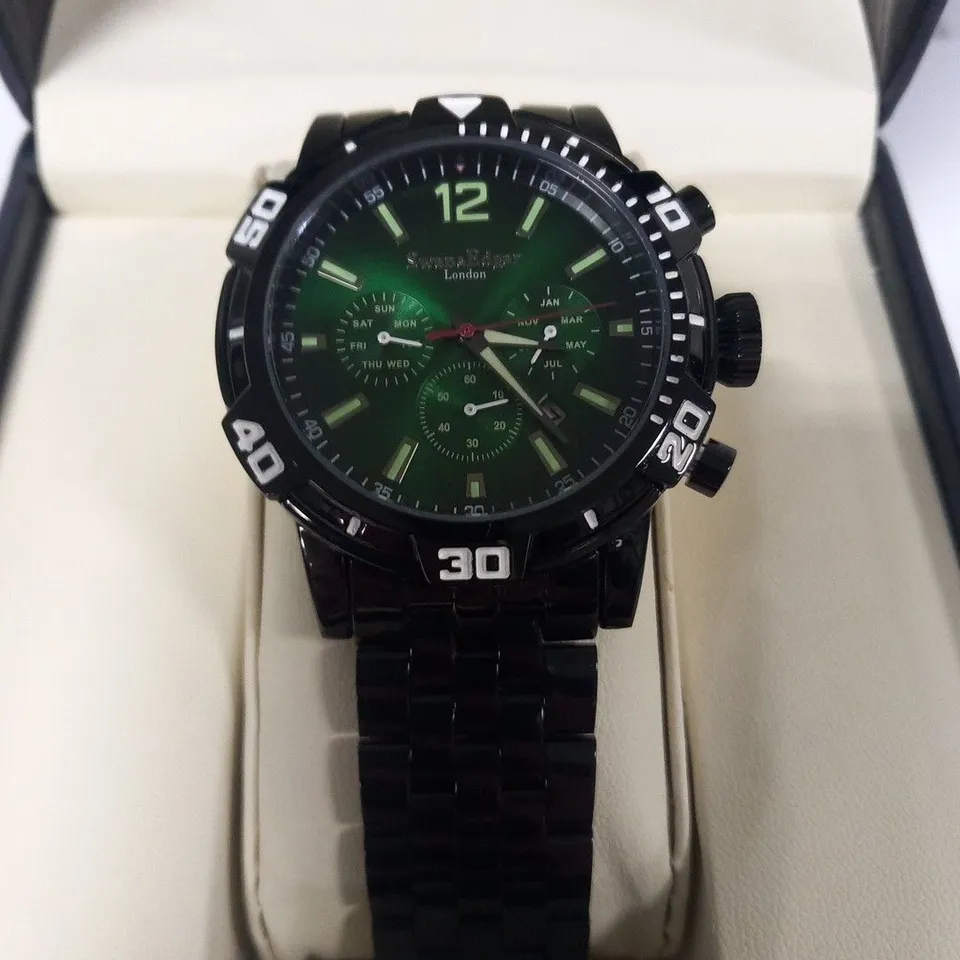BOXED SWAN & EDGAR BLACK METALLIC STRAP WRIST WATCH WITH GREEN FACE