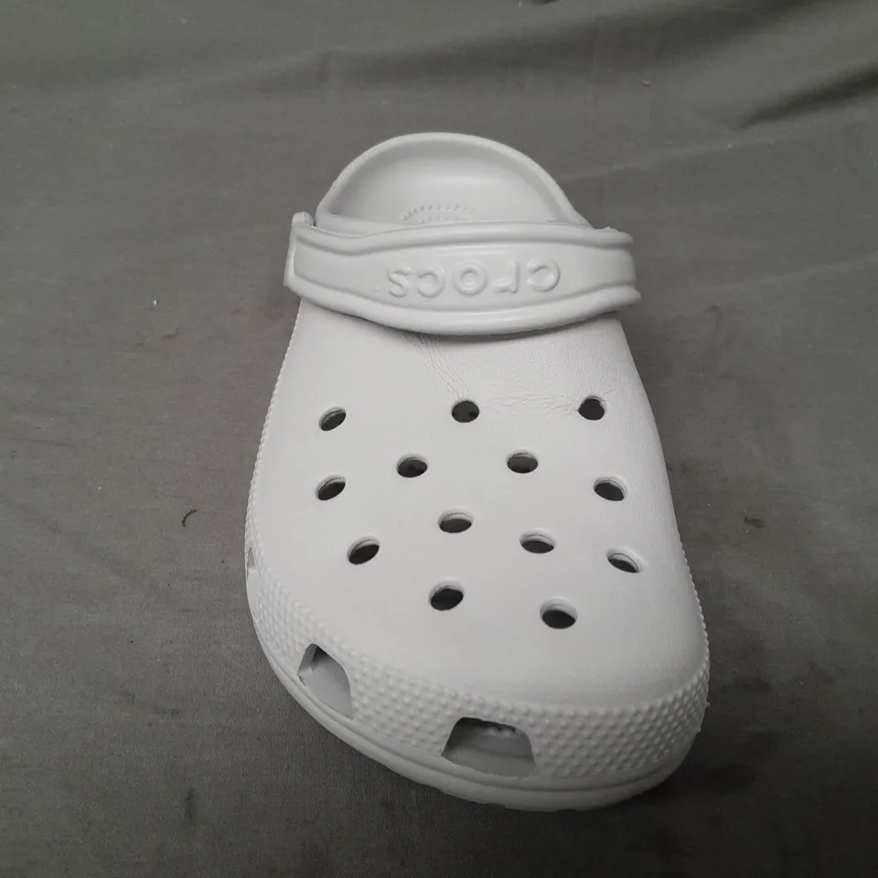 PAIR OF CROCS CLASSICS IN GREY UK SIZE M5/W6