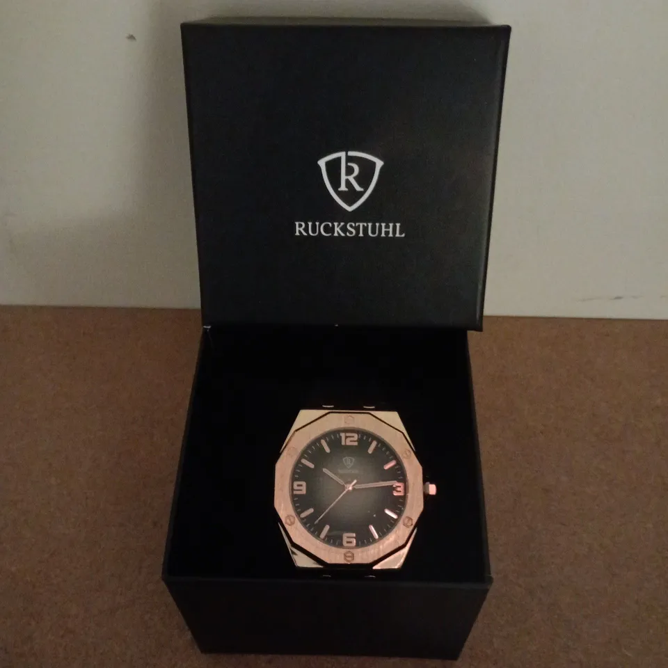 RUCKSTUHL ROSE GOLD COLOUR WRISTWATCH WITH RUBBER STRAP
