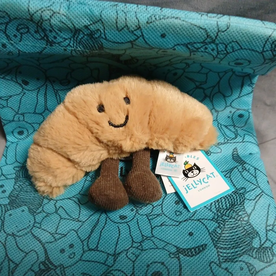 JELLYCAT LONDON PLUSH TOY – BEIGE FLUFFY ANIMAL WITH BROWN FEET