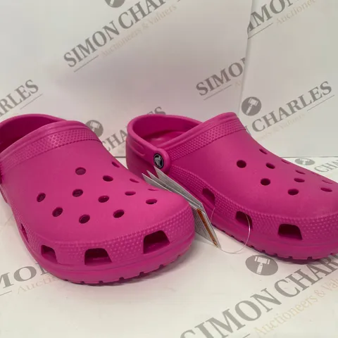 PAIR OF PINK CROCS SIZE M8 W10