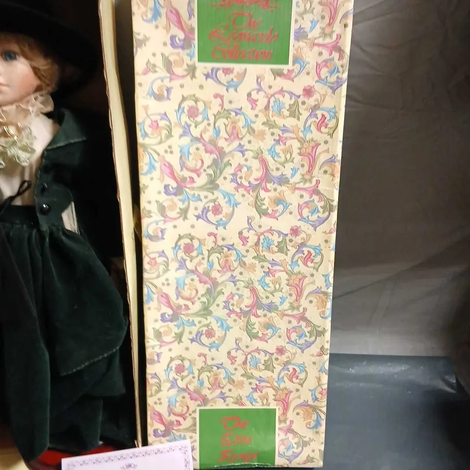 THE LEONARDO COLLECTION PORCELAIN DOLL IN VELVET GREEN OUTFIT – BOXED