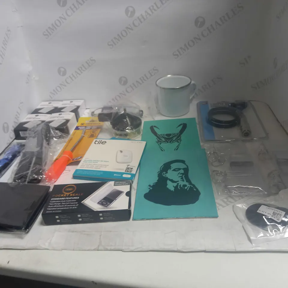 LOT OF ASSORTED HOUSEHOLD GOODS TO INCLUDE WINDOW ALERT ALARM, POCKET SCALE, AND TILE TRACKER ETC.