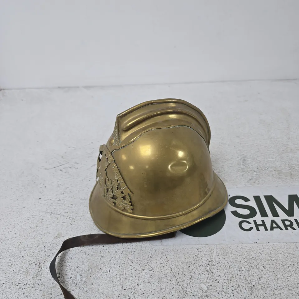 ANTIQUE BRASS MINIATURE FIREFIGHTER HELMET WITH POMPIERS CREST,