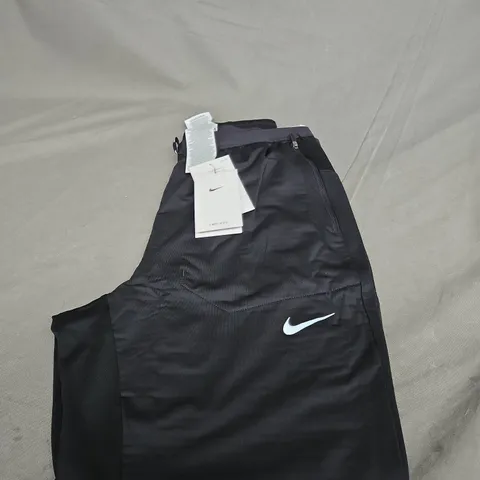 NIKE LOGO TROUSERS SIZE M 