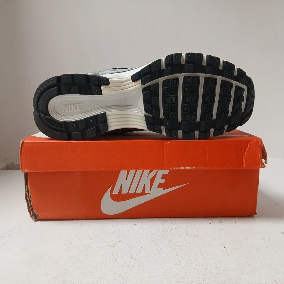 BOXED PAIR OF NIKE P-6000 TRAINERS IN METALLIC SILVER/GREY SIZE UK 9