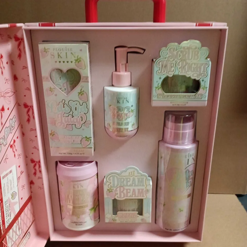 P LOUISE SKIN MINI SKINCARE GIFT SET IN PINK WHEELED TRAVEL CASE 