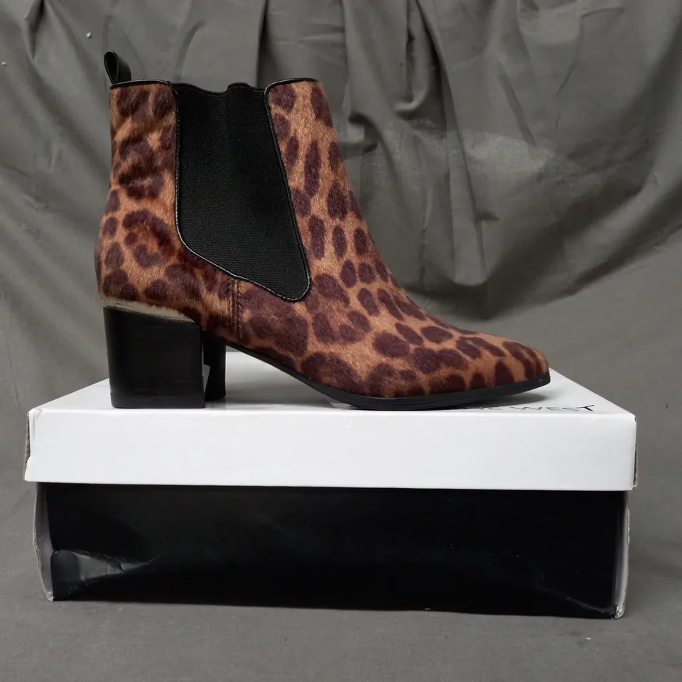 BOXED PAIR OF NINE WEST TAYE SYNTHETIC ANKLE BOOTS IN ANIMAL PRINT EU SIZE 35