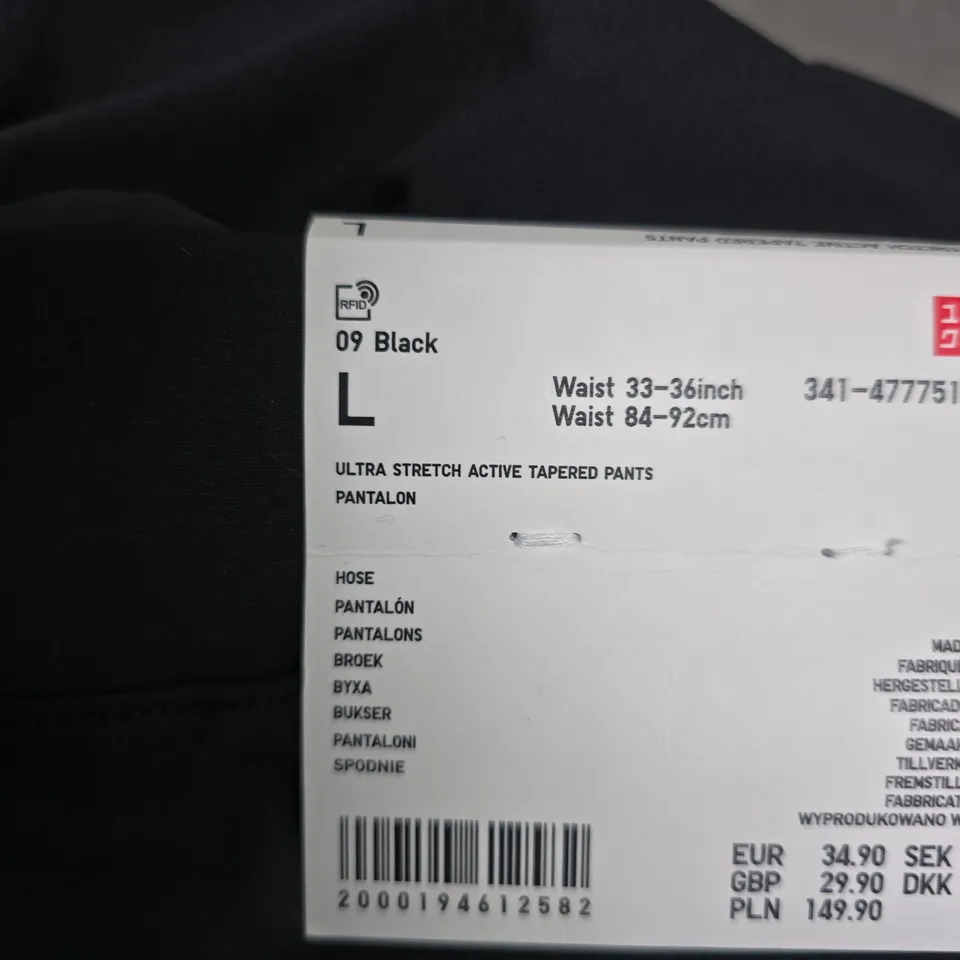 UNIQLO MEN'S ULTRA STRETCH ACTIVE TAPERED PANTS – BLACK, UK L (WAIST 33-36 IN)