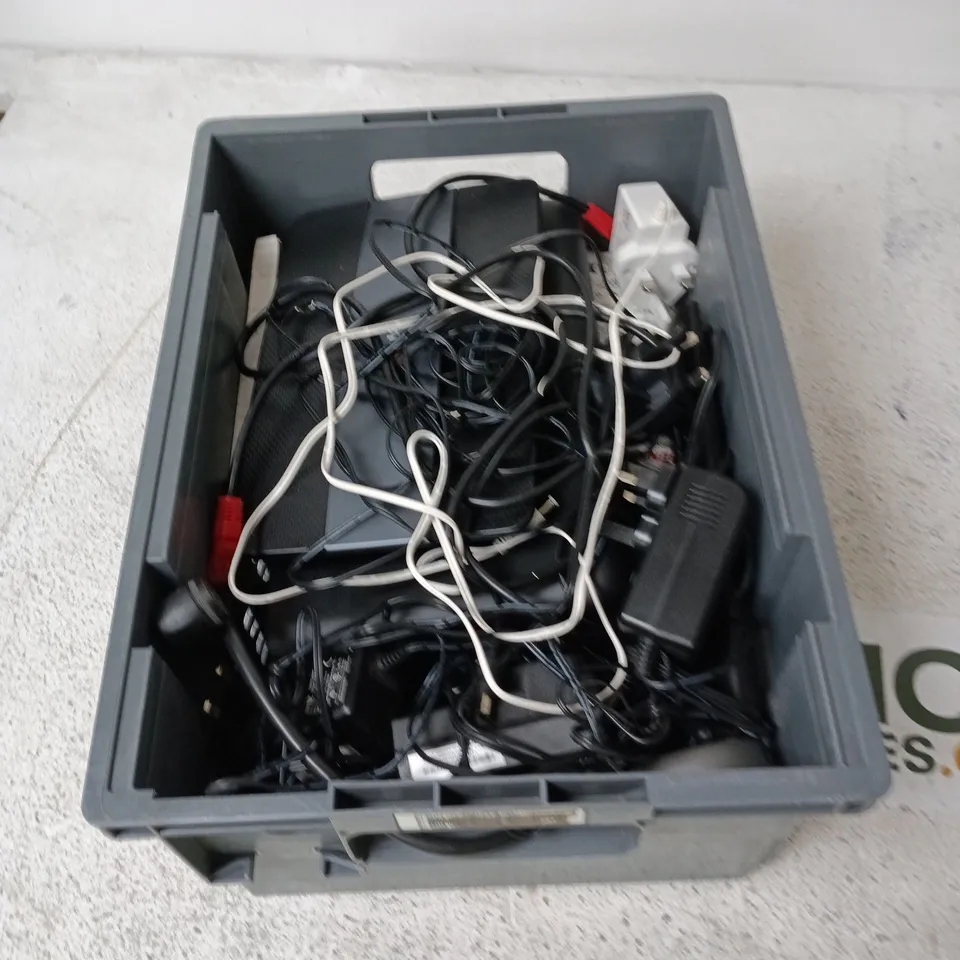 BOX CONTAINING A MIX OF APPROXIMATELY 15 ASSORTED ITEMS INCLUDING ROUTERS, REMOTES, PLUGS ETC.
