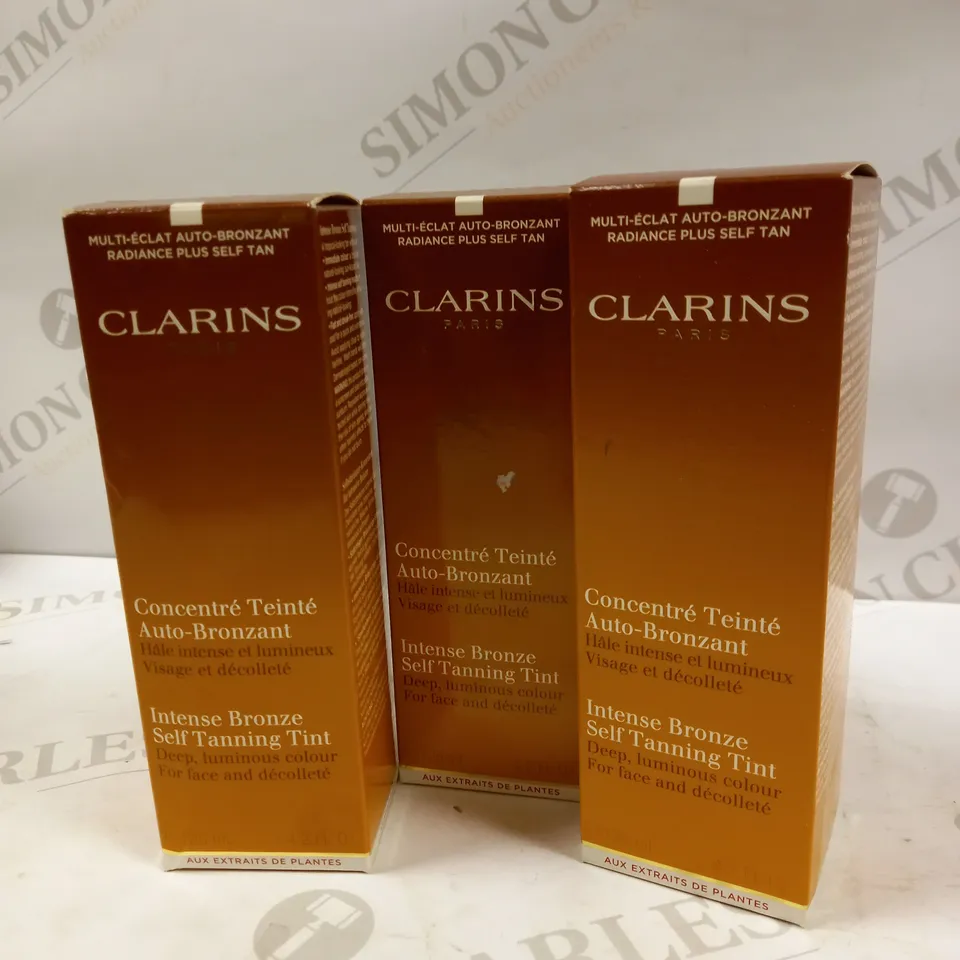 LOT OF APPROX 12 CLARINS PARIS INTENSE BRONZE SELF TANNING TINT 12 X 125ML