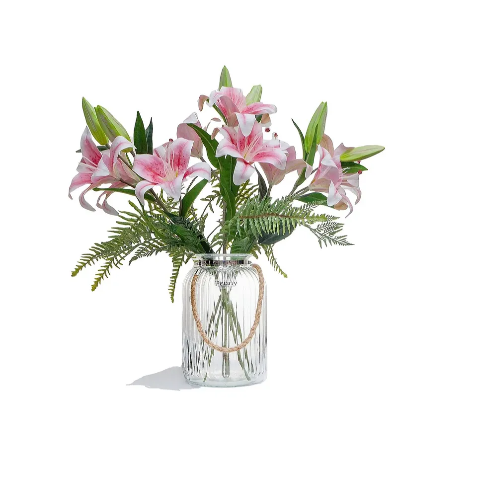 PEONY CASABLANCA LILIES AND FERN IN A ROPE LANTERN VASE