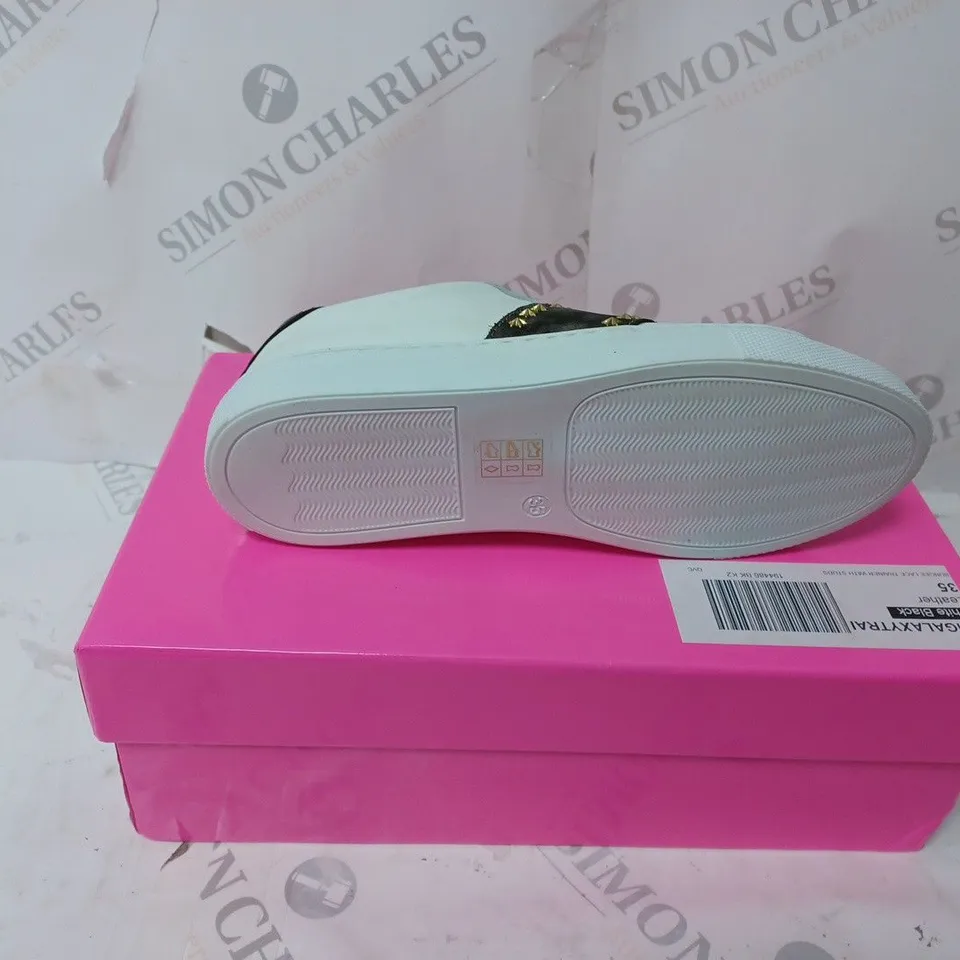 BOXED PAIR OF DANNII MINOGUE GALAXY TRAINERS IN WHITE W. STUDS SIZE 2