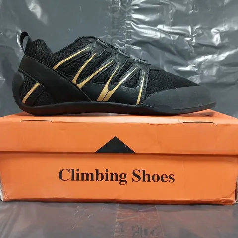 BOXED PAIR OF UNBRANDED CLIMBING SHOES IN BLACK/GOLD SIZE EU 45