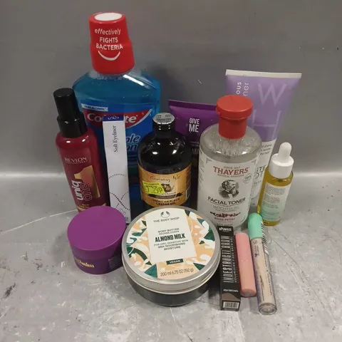 APPROXIMATELY 20 ASSORTED COSMETIC PRODUCTS INCLUDE - REVLON UNIQ ONE HAIR TREATMENT - THE BODY SHOP ALMOND MILK BODY BUTTER - GIVE ME HAIR MASK - ETC