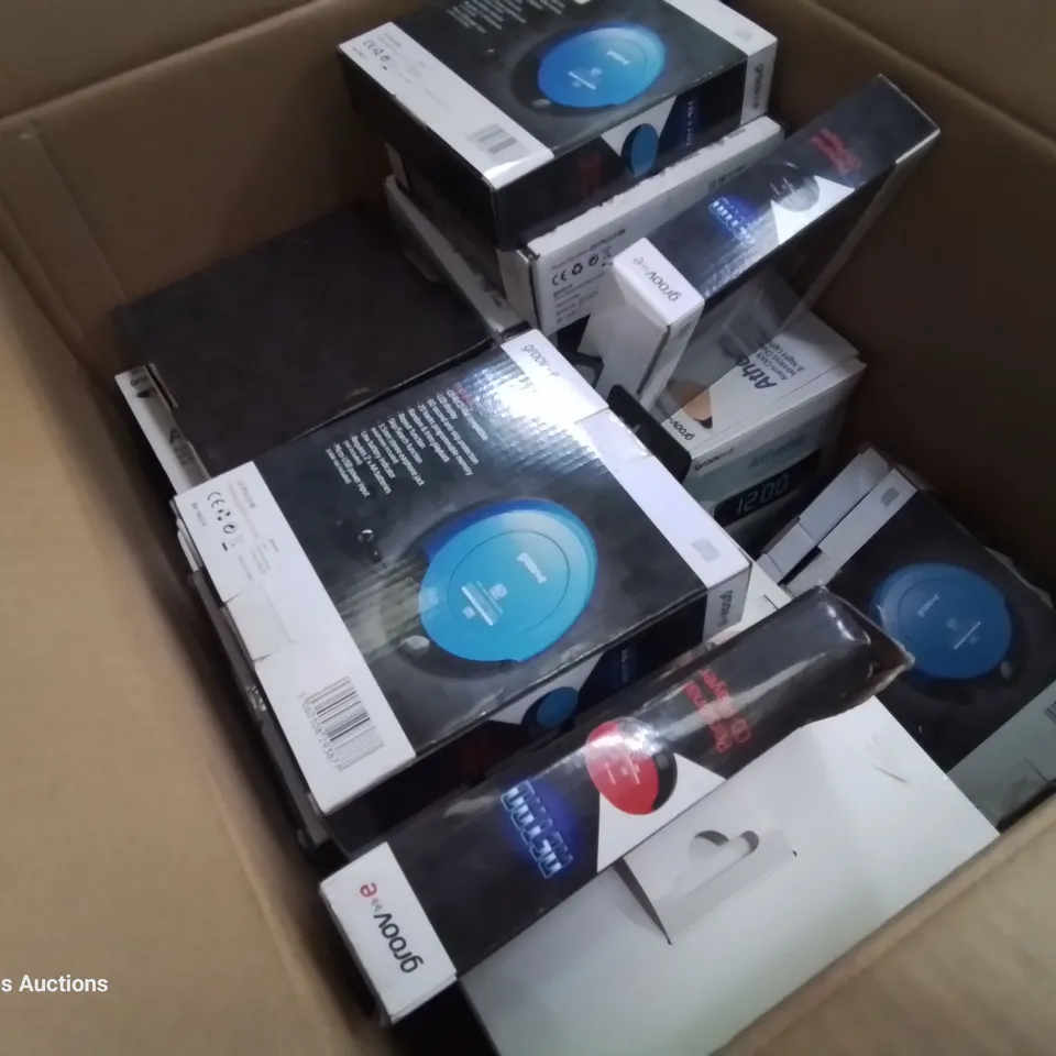 CASE OF ASSORTED ITEMS, INCLUDING 2 × KIDS HEADPHONES, 13 × GROOVE PERSONAL CD PLAYERS & 5 × ATHENA ALARM CLOCK RADIOS