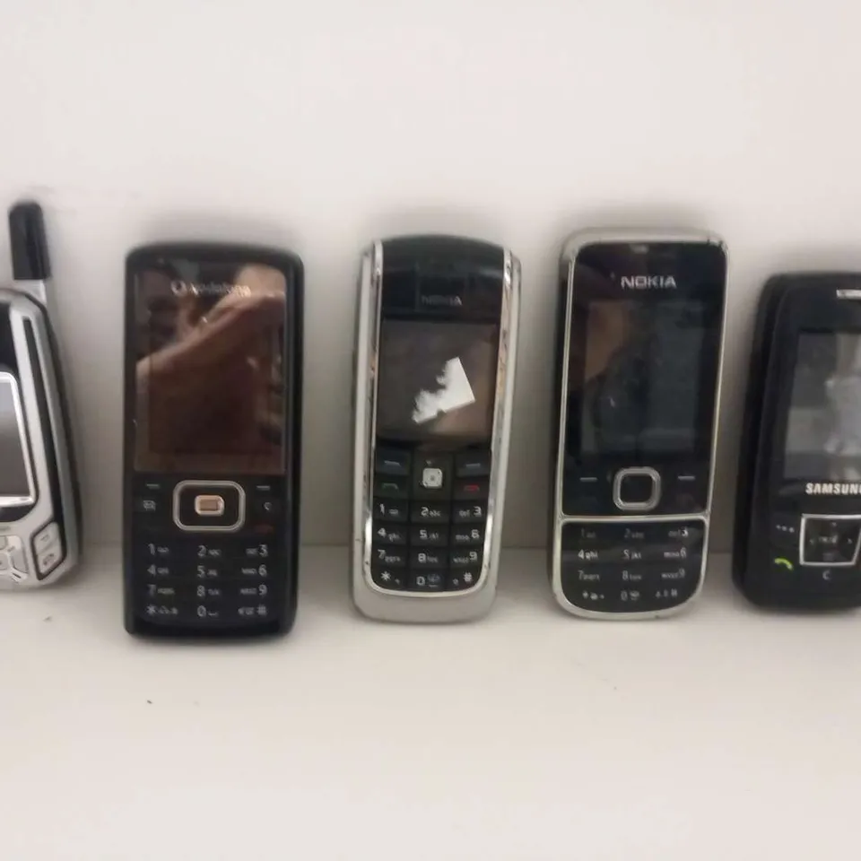 FIVE ASSORTED RETRO MOBILE PHONES