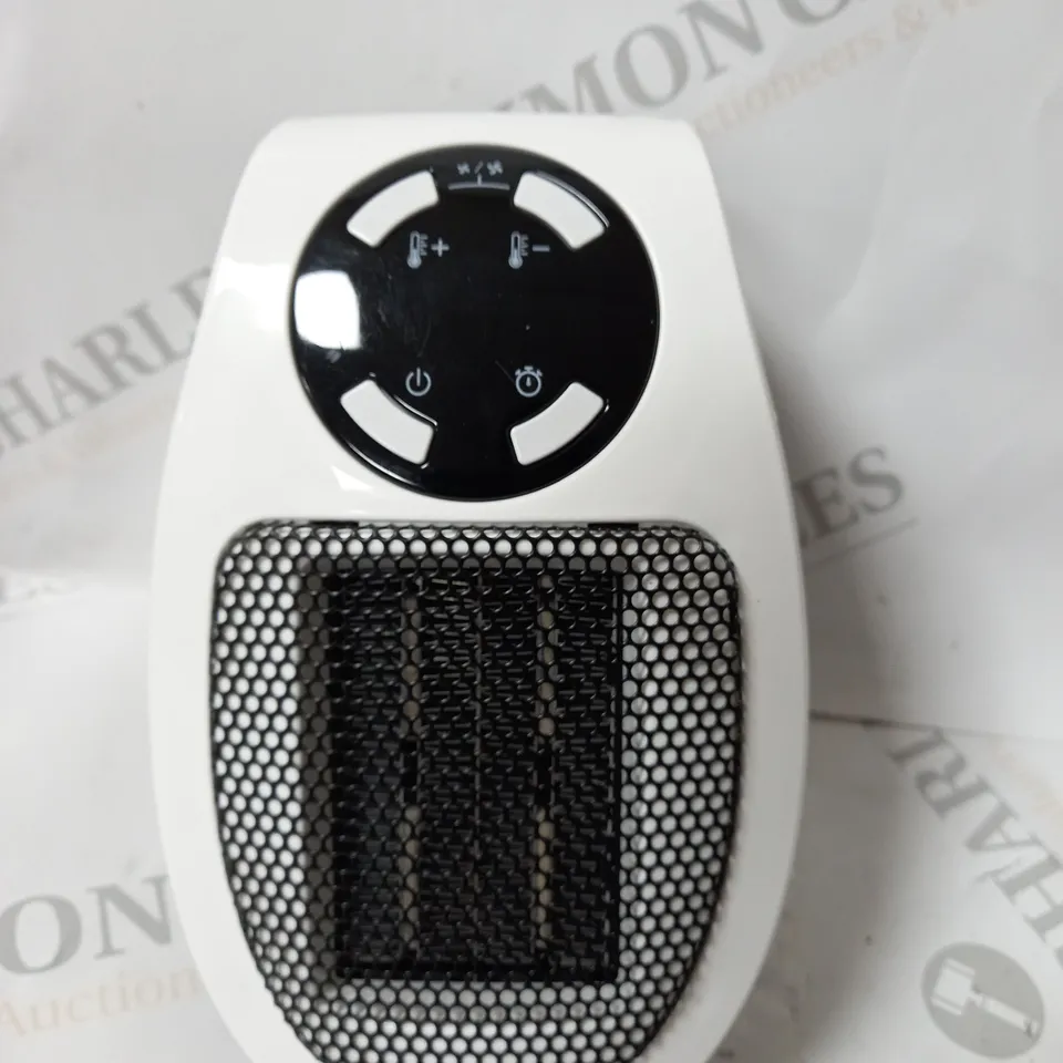 DAEWOO 500W DIGITAL PTC PLUG-IN HEATER WITH REMOTE CONTROL