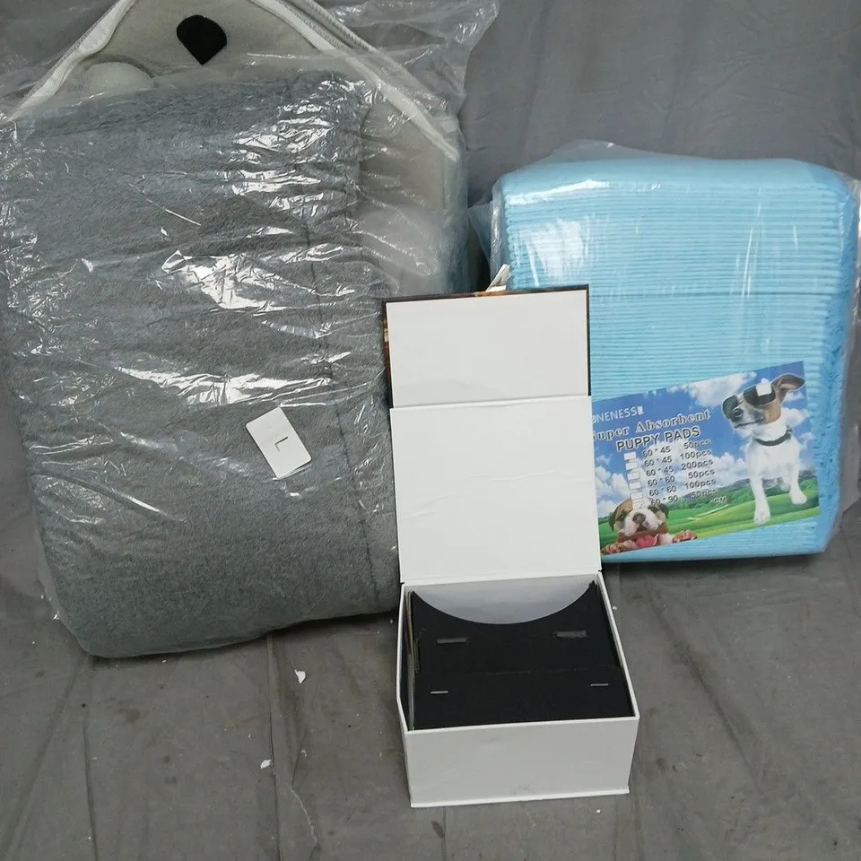 APPROXIMATELY 10 ASSORTED ITEMS TO INCLUDE PUPPY PADS, PHONE CARDBOARD VR SET, PET BED, ETC