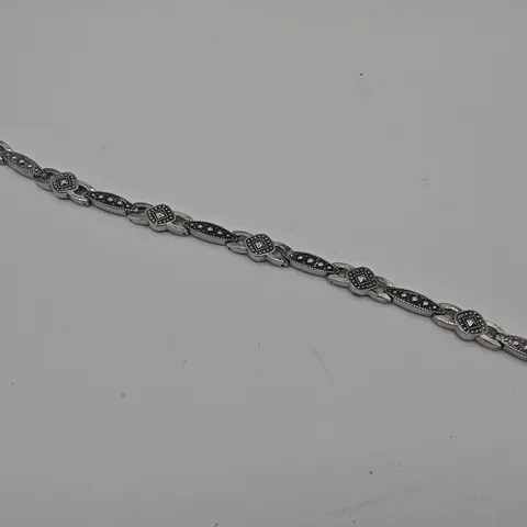 DECORATIVE SILVER TONE BRACELET