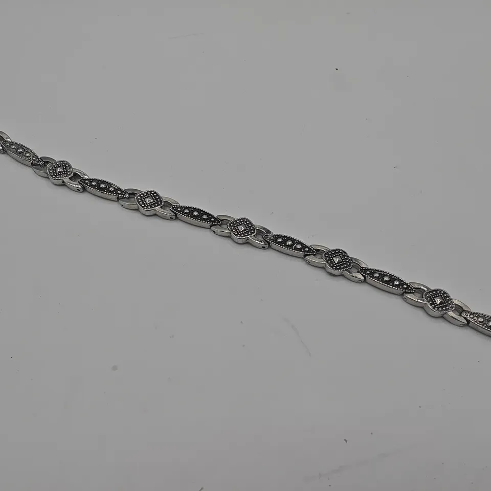 DECORATIVE SILVER TONE BRACELET 