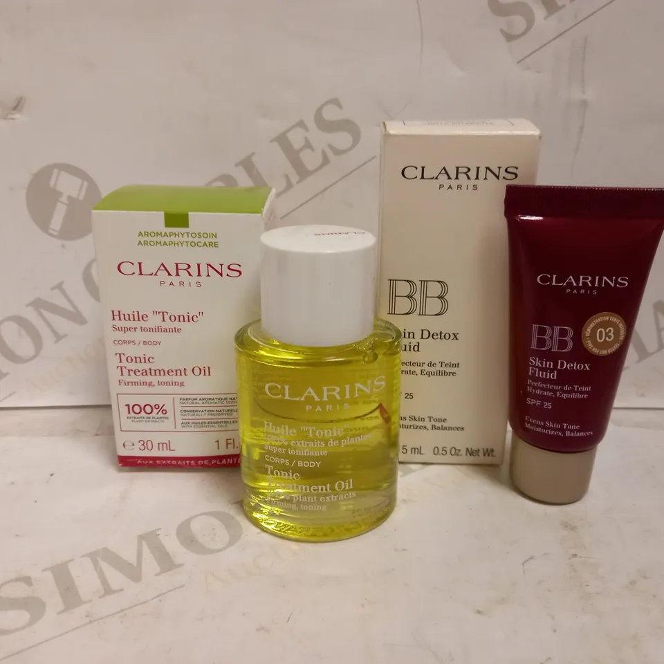 LOT OF 2 CLARINS PRODUCTS TO INCLUDE CLARINS BB SKIN DETOX FLUID, SPF 25 15ML - 03 DARK & TONIC TREATMENT OIL FIRMING TONIC 30 ML 