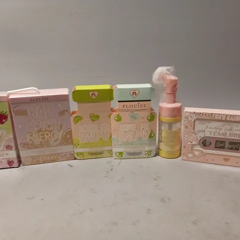 6 PLOUISE PRODUCTS TO INCLUDE DRIVE ME BALMY, CAKE IT ON, AND TEAM BRIDE ETC.
