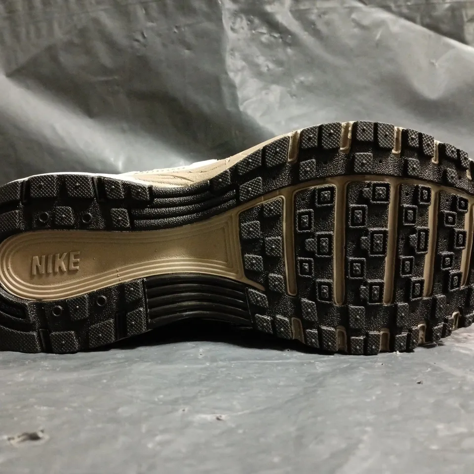 PAIR OF NIKE P-6000 TRAINERS IN TAN/BEIGE SIZE UK 4