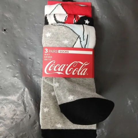 APPROXIMATELY 204 PAIRS OF COCA COLA POLAR BEAR SOCKS (6-11) - COLLECTION ONLY