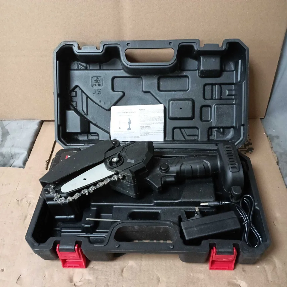 MINI ELECTRIC CHAIN SAW LITHIUM IN BLACK CARRY CASE, WITH INSTRUCTIONS. BOXED