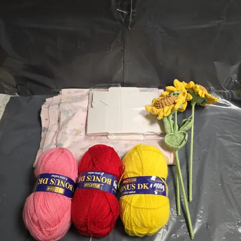 APPROXIMATELY 10 ASSORTED HOUSEHOLD ITEMS TO INCLUDE - CROCHET SUNFLOWERS - DK YARN - FABRIC - ETC