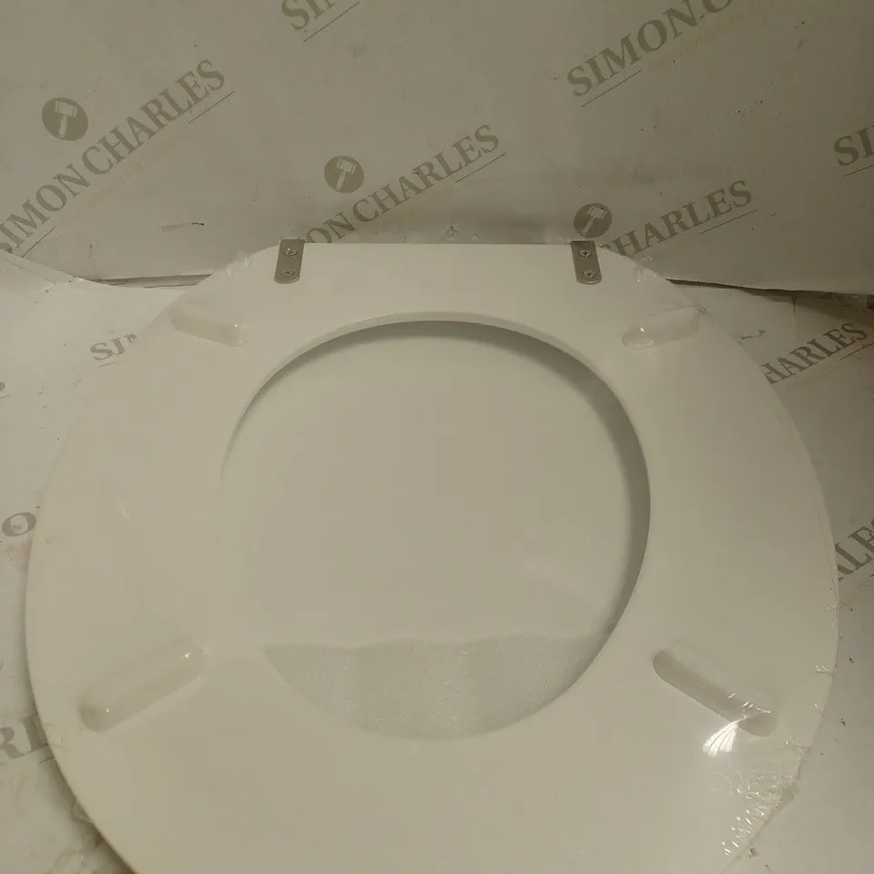 BOXED AND SEALED MDF TOILET SEAT. 
