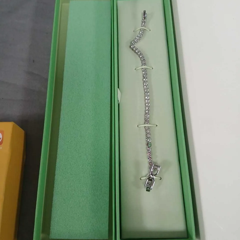 SWAROVSKI SILVER-TONE BRACELET WITH CLEAR STONES IN GREEN PRESENTATION BOX