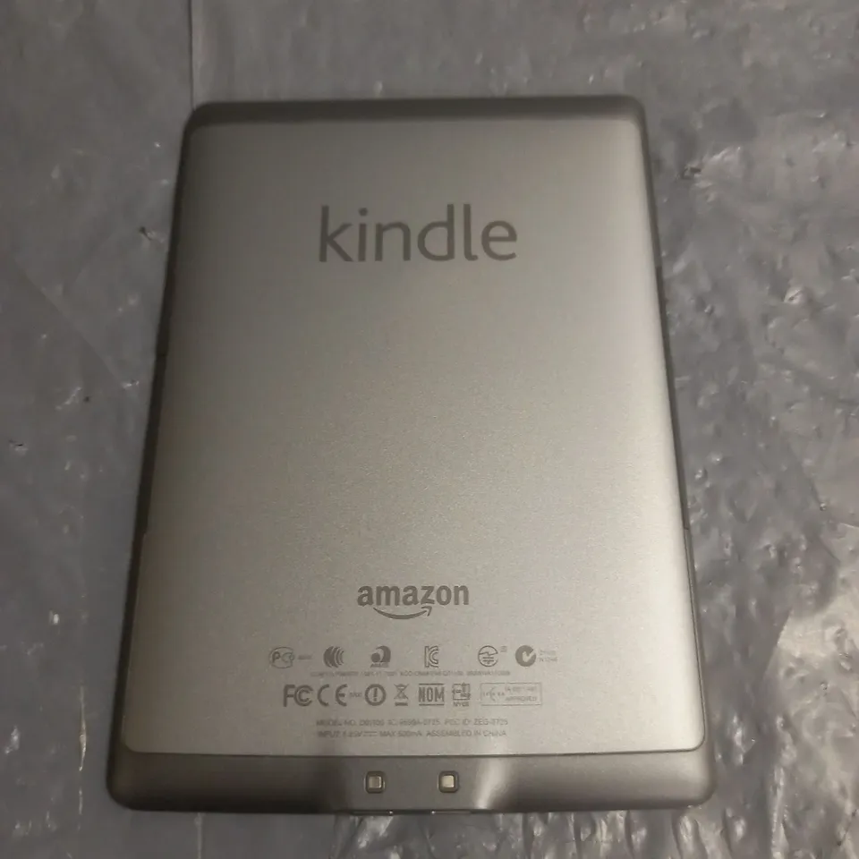 UNBOXED KINDLE DO1100 E-READER IN SILVER