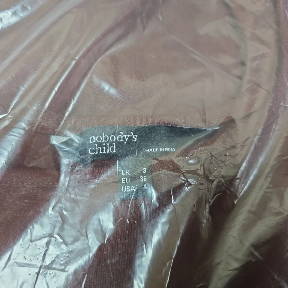 PALLET OF ASSORTED HOUSEHOLD AND CLOTHING ITEMS TO INCLUDE ROLLED RUGS, MOONDROP TWS EARBUDS, TOILET TISSUE MULTI-PACK AND VARIOUS CLOTHING ITEMS