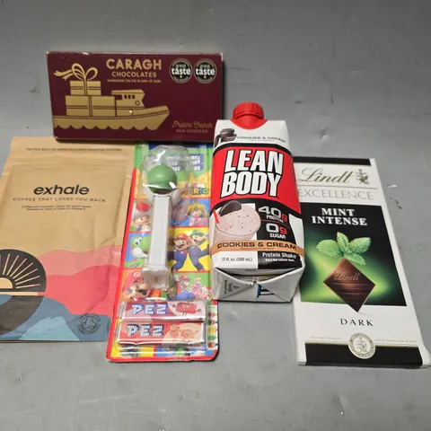 APPROXIMATELY 7 ASSORTED FOOD & DRINK ITEMS TO INCLUDE - LEAN BODY COOKIES & CREAM, PEZ , LINDT MINT INTENSE ETC