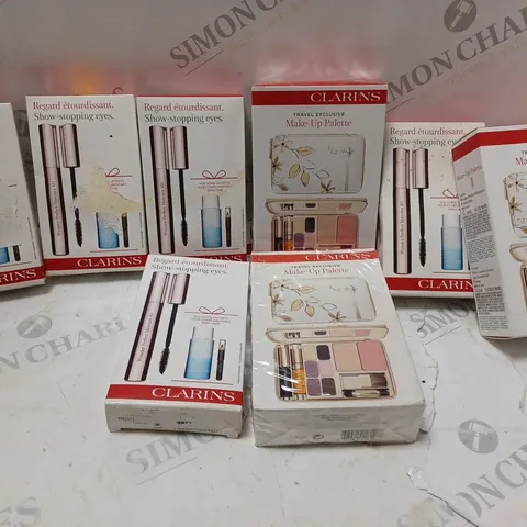 APPROXIMATELY 8 ASSORTED CLARINS PRODUCTS TO INCLUDE TRAVEL EXCLUSIVE MAKE-UP PALETTE, SHOW STOPPING EYE SET