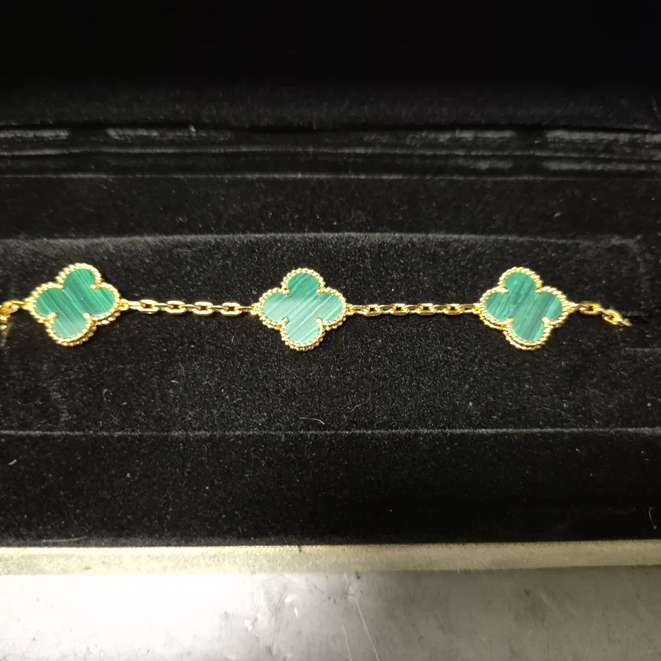 BOXED VAN CLEEF & ARPELS GOLDEN & GREEN BRACELET 