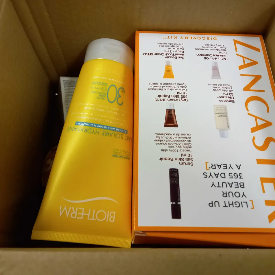 BOXED SUN & TRAVEL KIT 6 ASSORTED ITEMS TO INCLUDE - BIOTHERM LAIT SOLAIRE HYDRANTANT - LANCASTER SUN BEAUTY - NILAQUA HAND HYGIENE PACK ECT