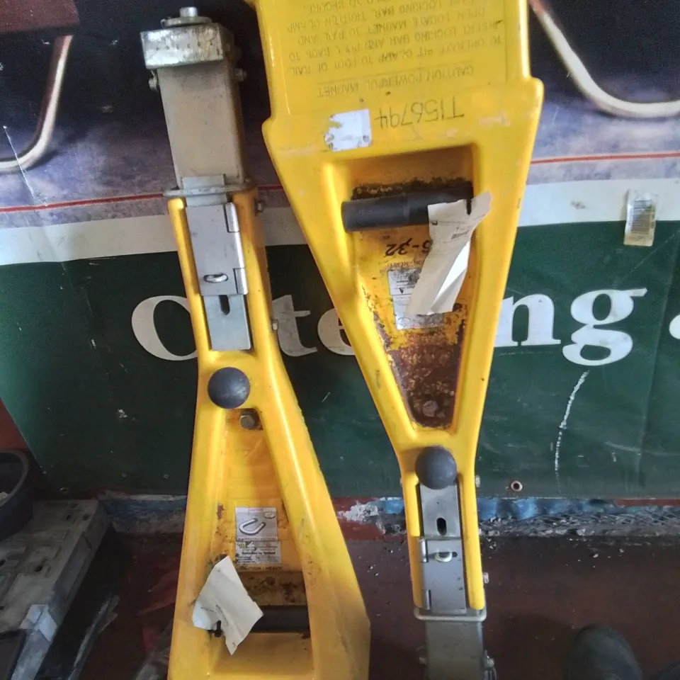 PAIR OF YELLOW TRACK MAGNET T BAR TOOLS