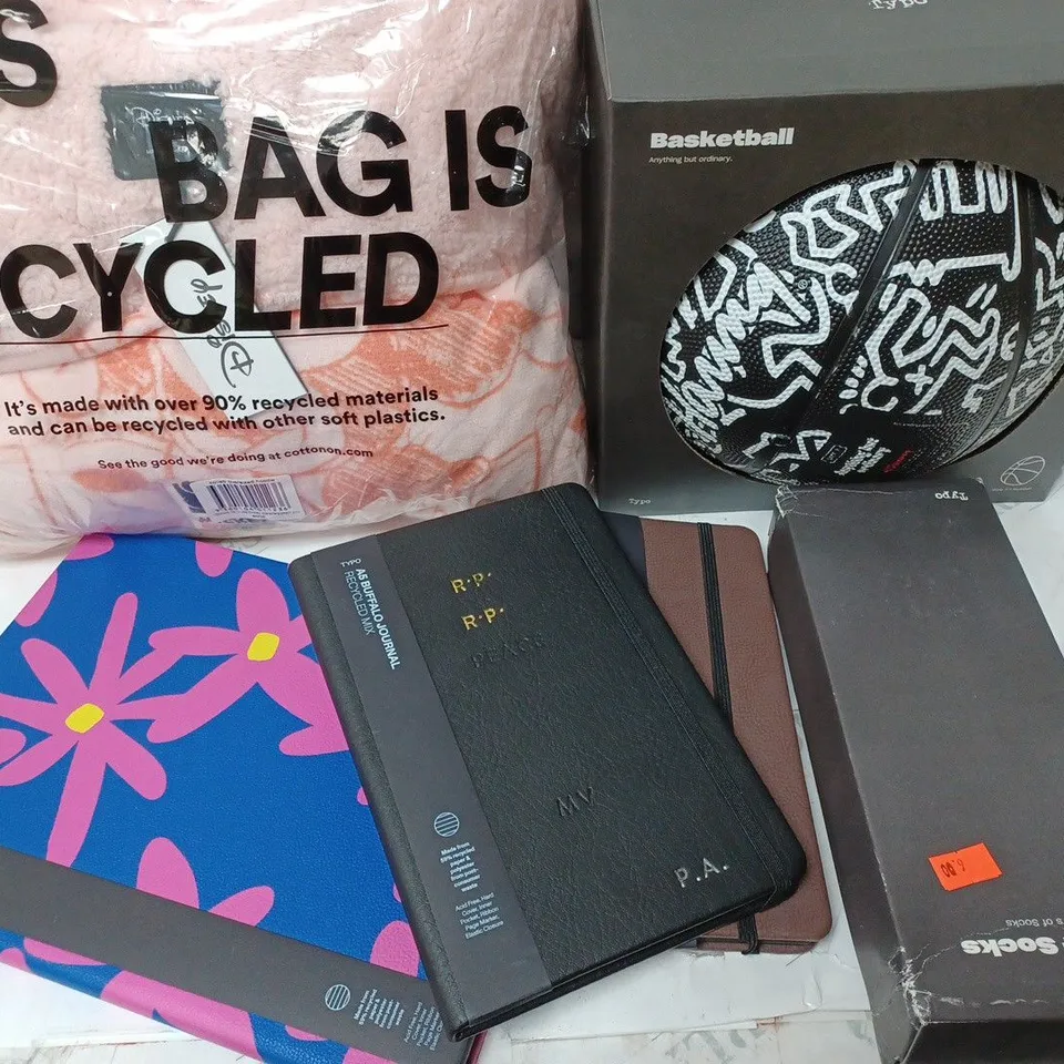 APPROXIMATELY 6 COTTON ON ITEMS INCLUDING THROW, BASKETBALL, NOTEBOOKS
