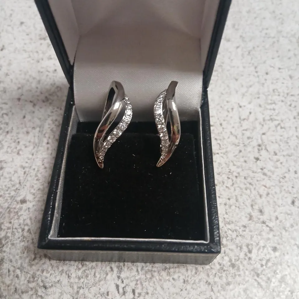 DIAMONIQUE EDIT PAVE WAVE HOOP EARRINGS