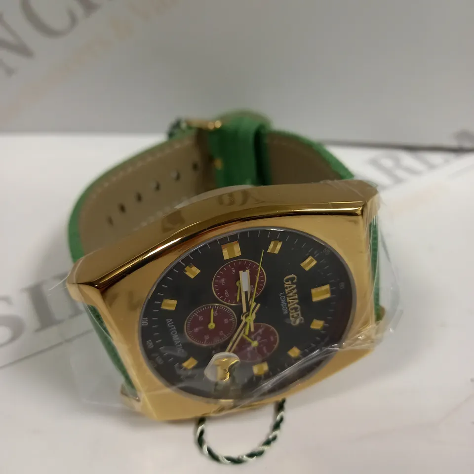 BOXED GAMAGES RETRO CALIBRE GOLD EFFECT CASE GREEN STRAP WATCH 