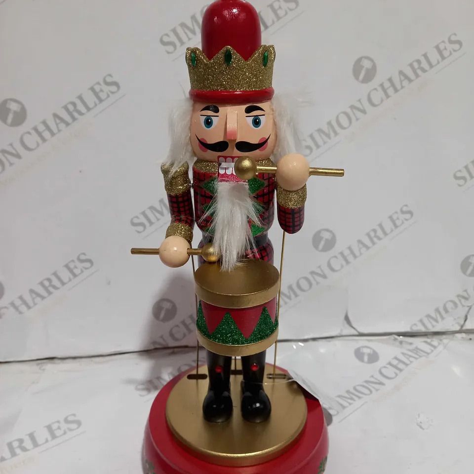 BOXED FESTIVE 32CM WOODEN ANIMATED MUSICAL NUTCRACKER