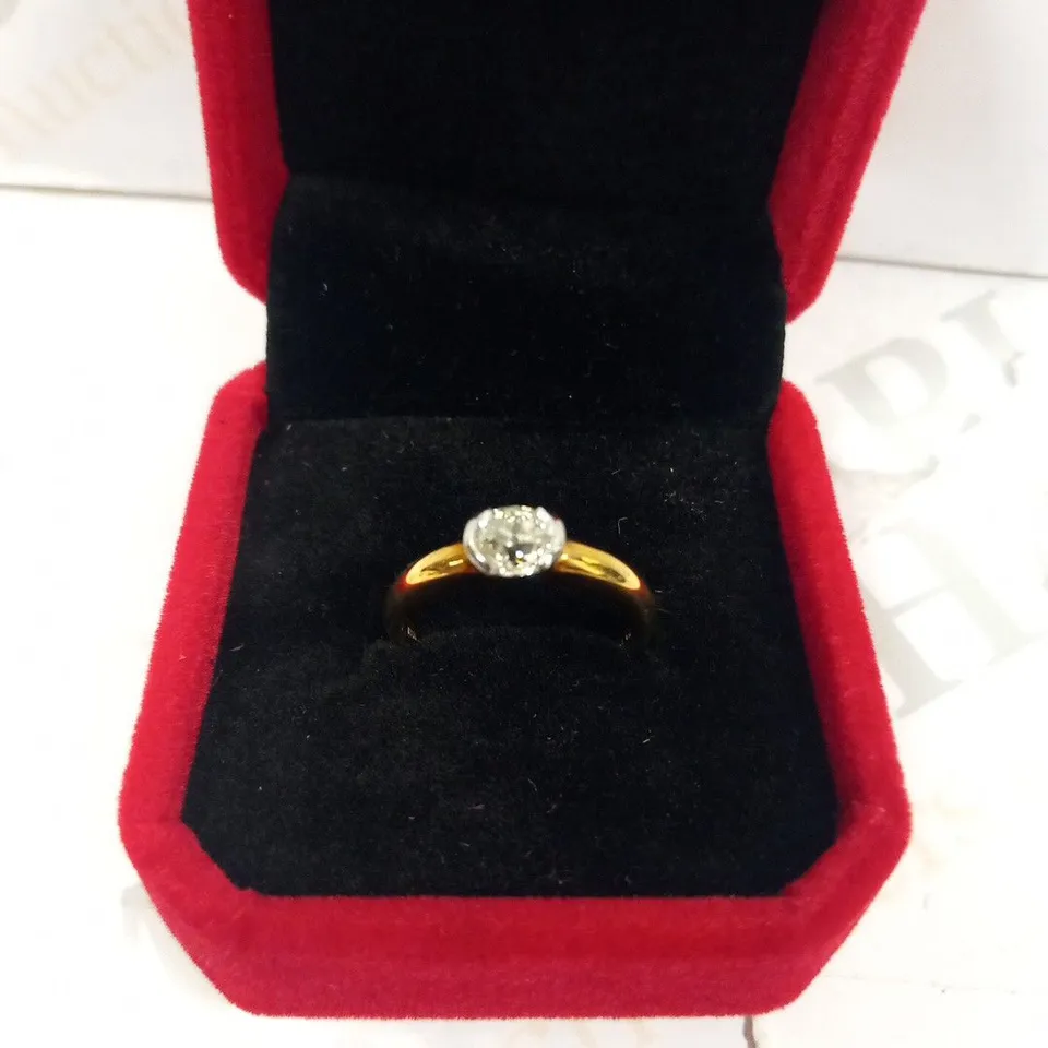 18CT GOLD SOLITAIRE RING SEMI RUB OVER SET WITH A DIAMOND WEIGHING +0.73CT